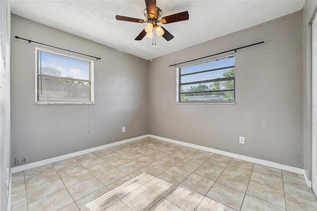 510 Peach Tree Ln, Altamonte Springs, FL 32701 - empty room with tile patterned flooring, a textured ceiling, and a ceiling fan