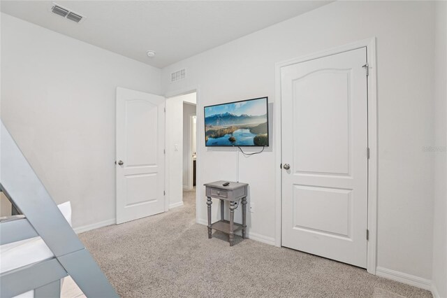 7033 Oakwood St, Davenport, FL 33837 - carpeted bedroom with baseboards