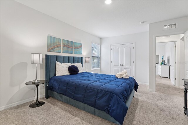7033 Oakwood St, Davenport, FL 33837 - bedroom with carpet floors and baseboards