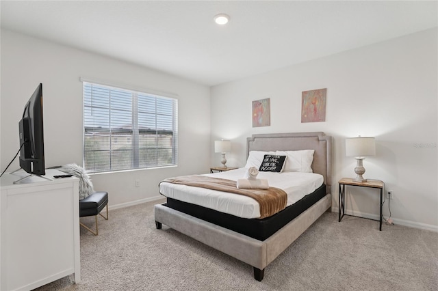 7033 Oakwood St, Davenport, FL 33837 - bedroom with carpet flooring and baseboards