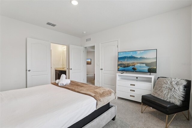 7033 Oakwood St, Davenport, FL 33837 - carpeted bedroom with connected bathroom