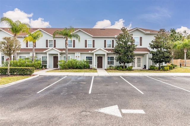 3203 Oyster Ln, Kissimmee, FL 34747 - view of front of property featuring uncovered parking and french doors