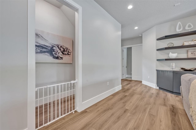 2459 Mcgregor Oaks Ln, Deland, FL 32720 - hall with light wood-type flooring, recessed lighting, and baseboards