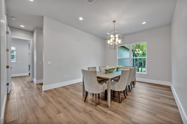 2459 Mcgregor Oaks Ln, Deland, FL 32720 - dining room with a chandelier, light wood finished floors, baseboards, and recessed lighting
