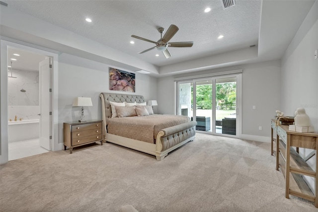 2459 Mcgregor Oaks Ln, Deland, FL 32720 - bedroom featuring access to exterior, light carpet, recessed lighting, ensuite bath, and a textured ceiling
