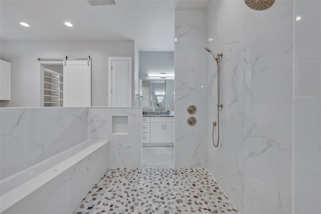 2459 Mcgregor Oaks Ln, Deland, FL 32720 - bathroom featuring a marble finish shower, a closet, vanity, and recessed lighting