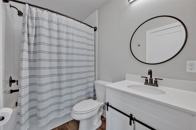 2459 Mcgregor Oaks Ln, Deland, FL 32720 - full bath with toilet, wood finished floors, vanity, and shower / tub combo