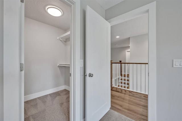 2459 Mcgregor Oaks Ln, Deland, FL 32720 - spacious closet featuring wood finished floors and carpet floors
