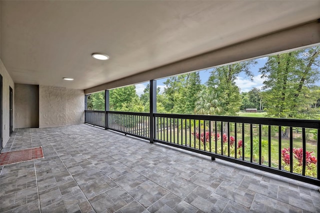 2459 Mcgregor Oaks Ln, Deland, FL 32720 - unfurnished sunroom featuring view of scattered trees