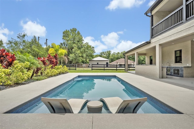 2459 Mcgregor Oaks Ln, Deland, FL 32720 - view of swimming pool featuring an outdoor kitchen and a patio