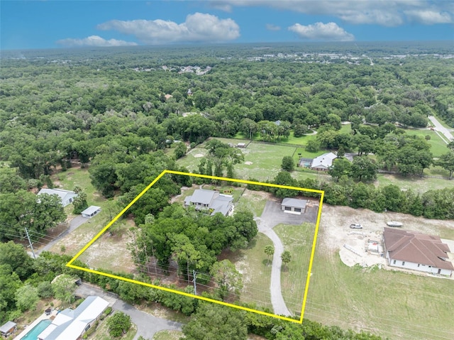 2459 Mcgregor Oaks Ln, Deland, FL 32720 - aerial view of property and surrounding area with property boundaries highlighted and a forest