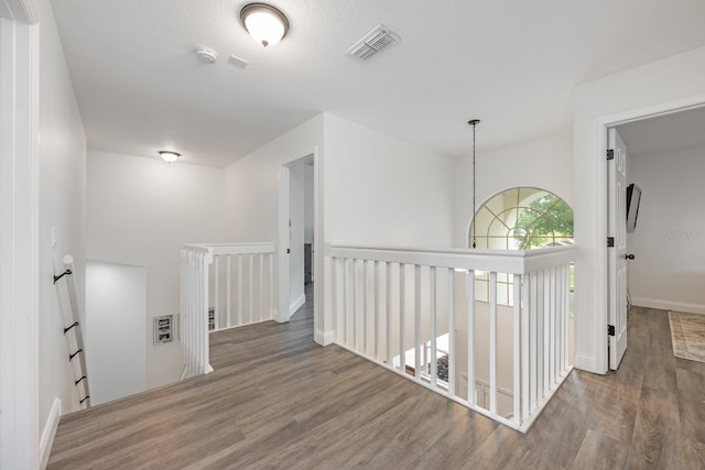10241 Pointview Ct, Orlando, FL 32836 - hall featuring an upstairs landing, wood finished floors, and baseboards
