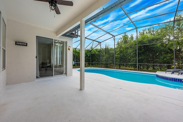 10241 Pointview Ct, Orlando, FL 32836 - swimming pool with a patio, a ceiling fan, and a lanai