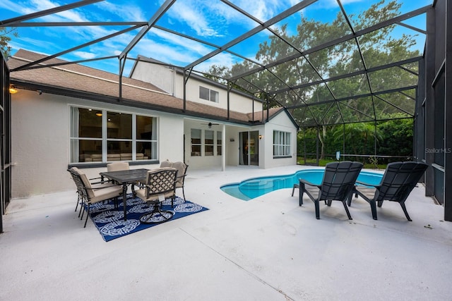 10241 Pointview Ct, Orlando, FL 32836 - outdoor pool with a patio, a ceiling fan, and a lanai