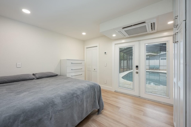 5108 Saint Albans Ave, Siesta Key, FL 34242 - bedroom featuring french doors, access to exterior, light wood finished floors, recessed lighting, and baseboards