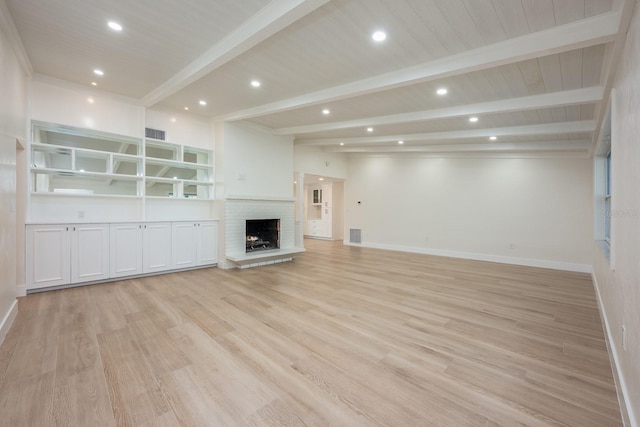 5108 Saint Albans Ave, Siesta Key, FL 34242 - unfurnished living room with beam ceiling, light wood-style floors, baseboards, a fireplace, and recessed lighting