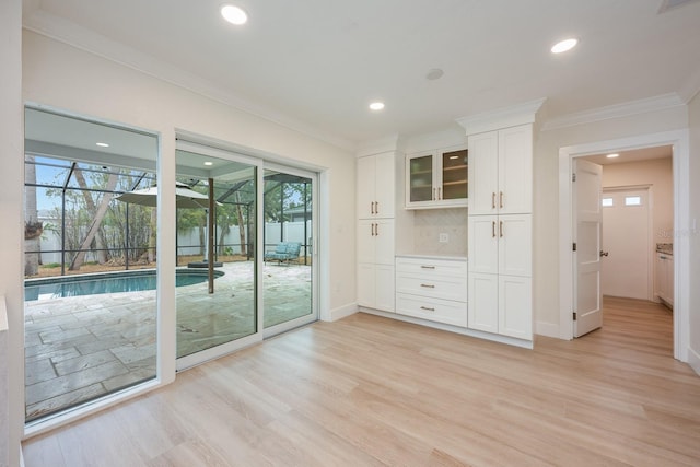 5108 Saint Albans Ave, Siesta Key, FL 34242 - spare room with ornamental molding, light wood-style flooring, baseboards, and recessed lighting