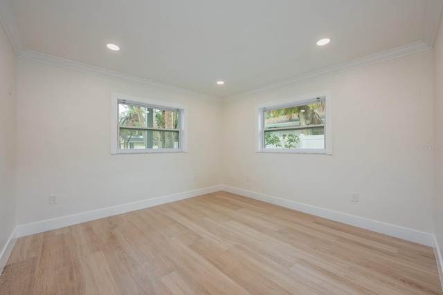 5108 Saint Albans Ave, Siesta Key, FL 34242 - empty room with plenty of natural light, light wood-style flooring, crown molding, baseboards, and recessed lighting