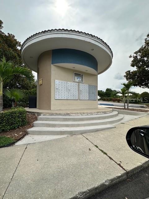 7350 Westpointe Blvd Unit 234, Orlando, FL 32835 - view of home's community featuring mail area