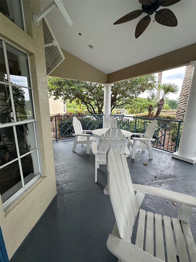 7350 Westpointe Blvd Unit 234, Orlando, FL 32835 - view of patio with ceiling fan and outdoor dining space
