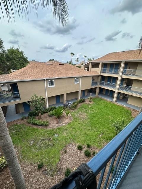 7350 Westpointe Blvd Unit 234, Orlando, FL 32835 - view of property's community featuring a lawn