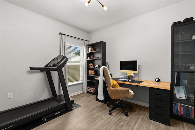 17416 Painted Leaf Way, Clermont, FL 34714 - home office with light wood-type flooring and baseboards