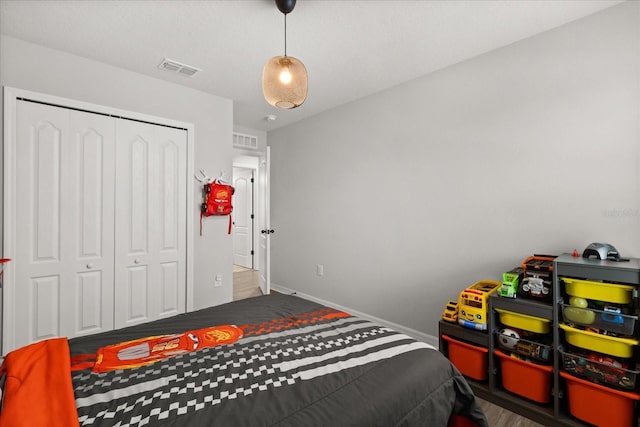 17416 Painted Leaf Way, Clermont, FL 34714 - bedroom featuring baseboards and a closet