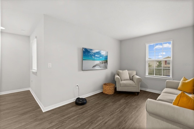 17416 Painted Leaf Way, Clermont, FL 34714 - living room featuring dark wood finished floors and baseboards