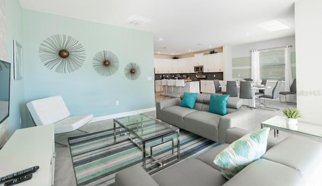 8986 Cabot Cliffs Dr, Davenport, FL 33896 - living area with baseboards and recessed lighting