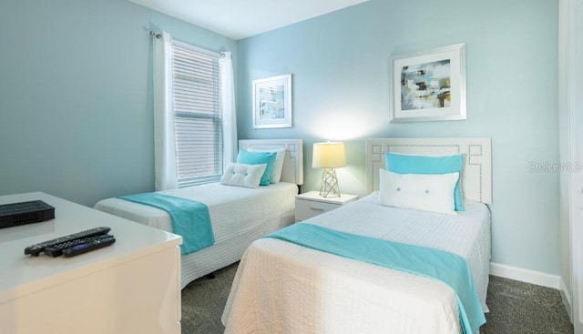 8986 Cabot Cliffs Dr, Davenport, FL 33896 - carpeted bedroom with baseboards