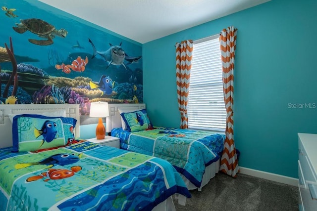 8986 Cabot Cliffs Dr, Davenport, FL 33896 - carpeted bedroom with baseboards