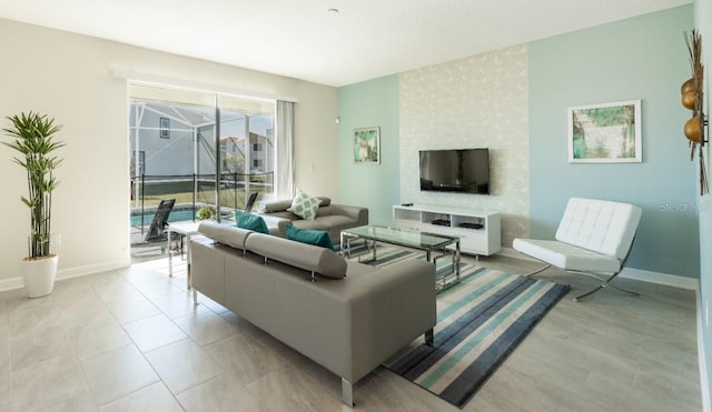 8986 Cabot Cliffs Dr, Davenport, FL 33896 - living room with baseboards