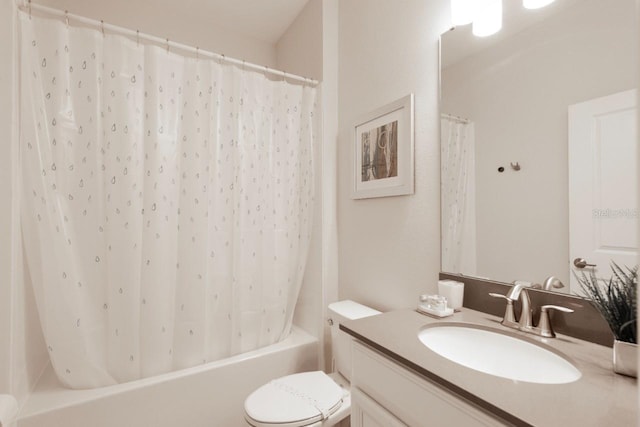 8986 Cabot Cliffs Dr, Davenport, FL 33896 - bathroom with vanity, toilet, and shower / bath combo with shower curtain