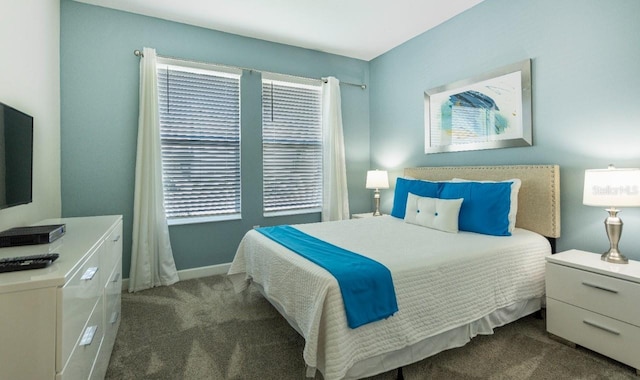 8986 Cabot Cliffs Dr, Davenport, FL 33896 - carpeted bedroom with multiple windows and baseboards