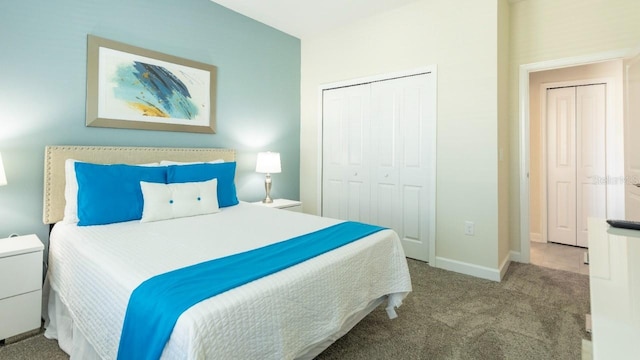 8986 Cabot Cliffs Dr, Davenport, FL 33896 - carpeted bedroom featuring a closet and baseboards