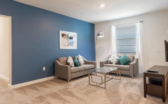 8986 Cabot Cliffs Dr, Davenport, FL 33896 - living room featuring carpet flooring and baseboards