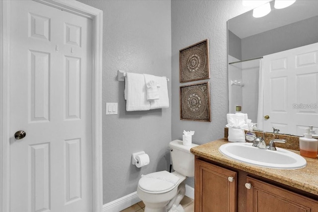 3214 Calabria Ave, Davenport, FL 33897 - full bathroom with vanity, toilet, a shower, a textured wall, and baseboards