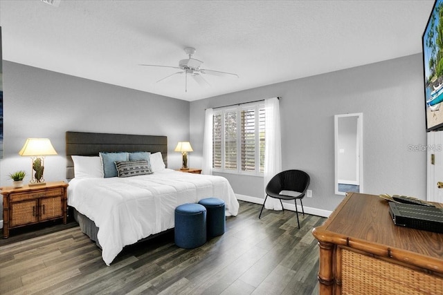 3214 Calabria Ave, Davenport, FL 33897 - bedroom featuring wood finished floors, baseboards, and ceiling fan