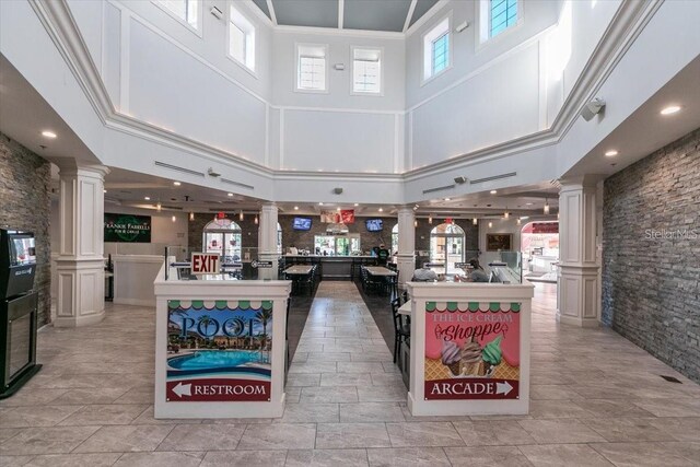 3214 Calabria Ave, Davenport, FL 33897 - community lobby featuring a towering ceiling