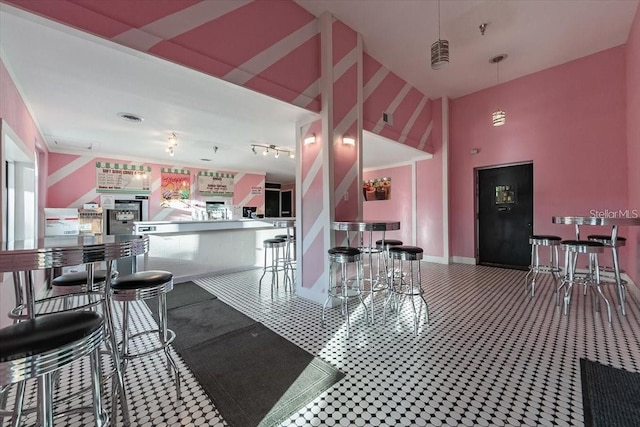 3214 Calabria Ave, Davenport, FL 33897 - kitchen with baseboards and a towering ceiling