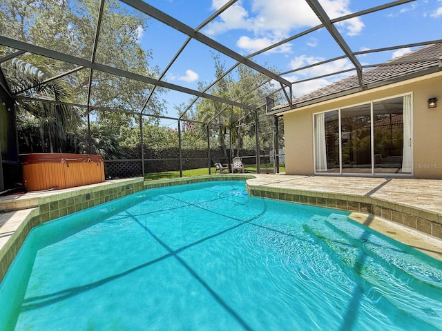 3307 Kentshire Blvd, Ocoee, FL 34761 - view of swimming pool with a hot tub, a patio, and a lanai