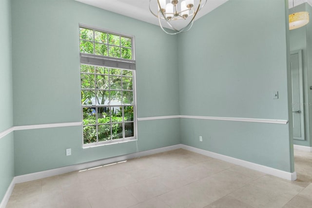 3307 Kentshire Blvd, Ocoee, FL 34761 - unfurnished room with a chandelier, baseboards, and tile patterned floors