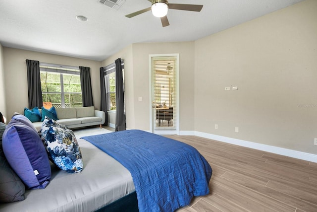 3307 Kentshire Blvd, Ocoee, FL 34761 - bedroom featuring light wood-style flooring, baseboards, and a ceiling fan