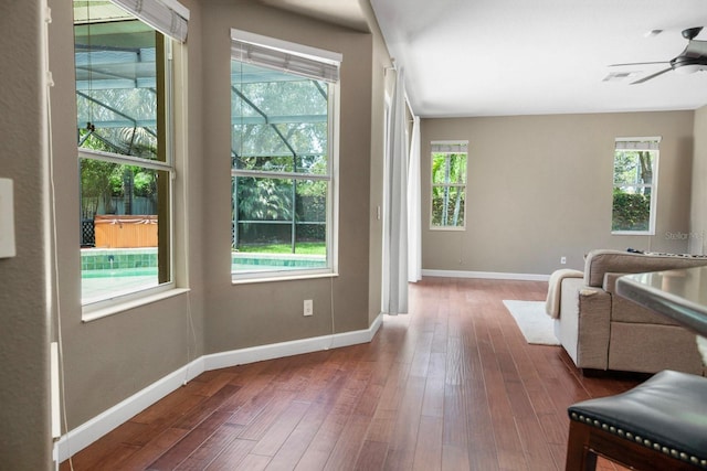 3307 Kentshire Blvd, Ocoee, FL 34761 - living room with a ceiling fan, wood finished floors, and baseboards