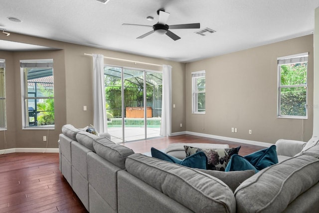 3307 Kentshire Blvd, Ocoee, FL 34761 - living room with dark wood finished floors, ceiling fan, and plenty of natural light