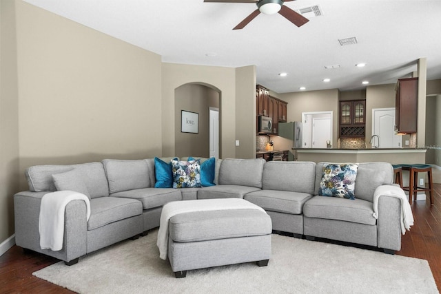 3307 Kentshire Blvd, Ocoee, FL 34761 - living area with wood finished floors, ceiling fan, arched walkways, recessed lighting, and baseboards