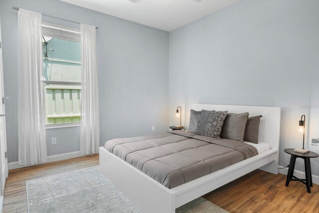 3307 Kentshire Blvd, Ocoee, FL 34761 - bedroom featuring wood finished floors and baseboards