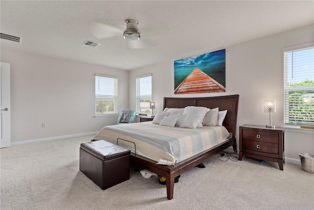 2168 Aibonito Cir, Clermont, FL 34711 - bedroom featuring carpet flooring, multiple windows, and a ceiling fan