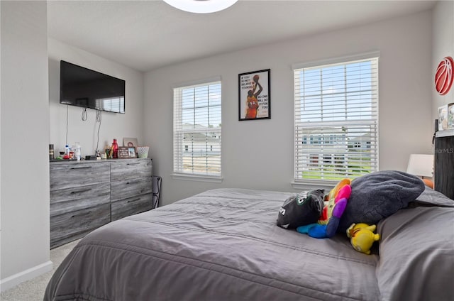 2168 Aibonito Cir, Clermont, FL 34711 - carpeted bedroom featuring baseboards