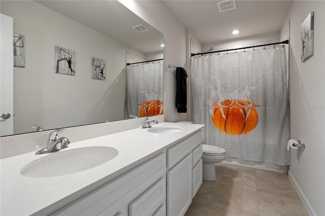 2168 Aibonito Cir, Clermont, FL 34711 - bathroom with double vanity, recessed lighting, and a shower with shower curtain